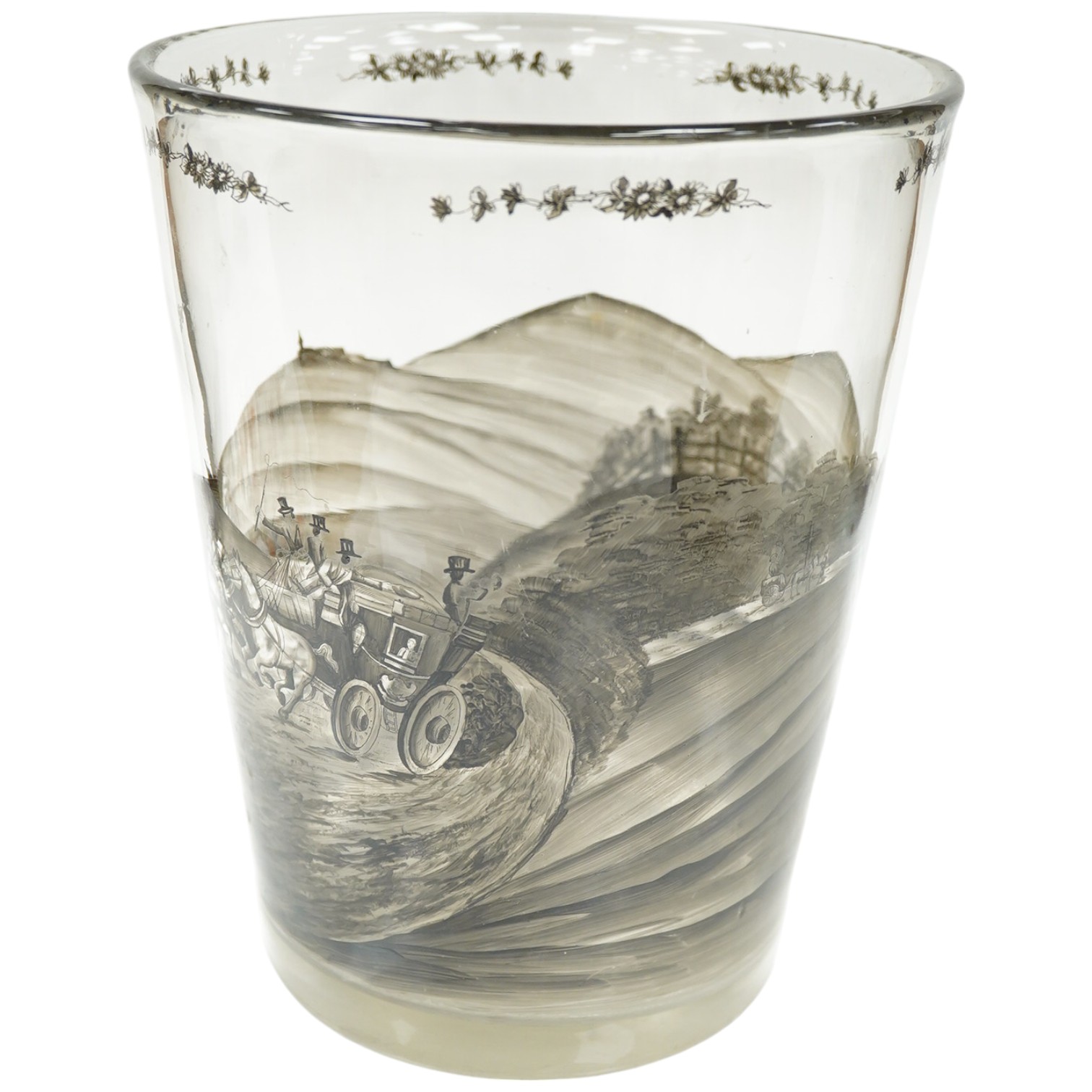 A large German Schwarzlot glass beaker vase, decorated with a painted agricultural scene, 27.5cm high. Condition - fair to good, one chip to the rim and scratches to the base